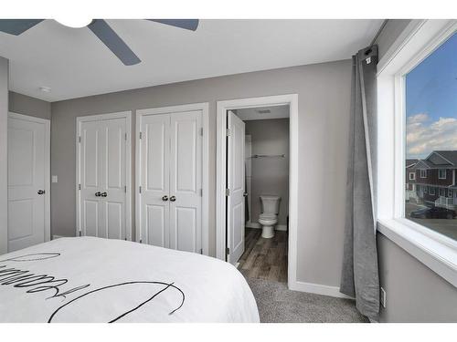 11-4716 College Avenue, Lacombe, AB - Indoor Photo Showing Bedroom