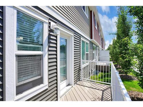 11-4716 College Avenue, Lacombe, AB - Outdoor With Deck Patio Veranda