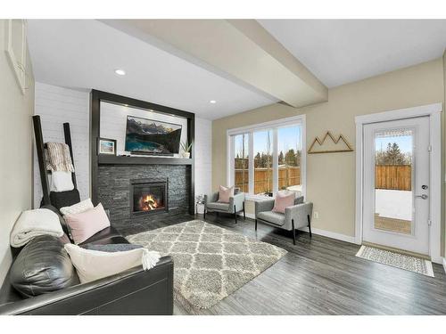 4980 Aspen Lake Boulevard, Blackfalds, AB - Indoor Photo Showing Living Room With Fireplace