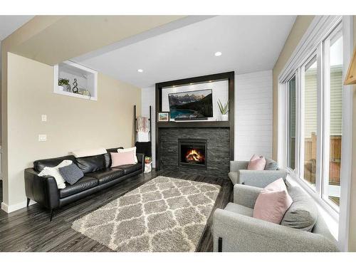 4980 Aspen Lake Boulevard, Blackfalds, AB - Indoor Photo Showing Living Room With Fireplace