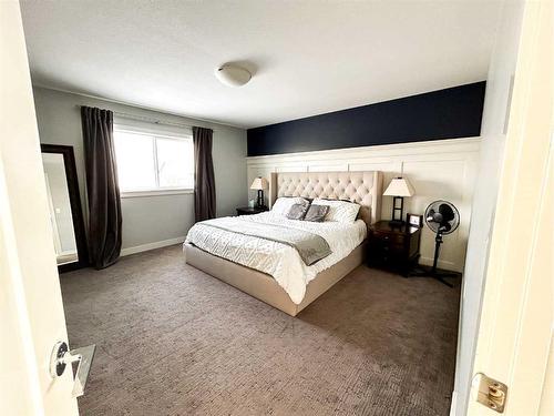 3910 48A Avenue, Ponoka, AB - Indoor Photo Showing Bedroom