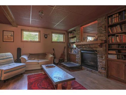 5716 60 Avenue, Rocky Mountain House, AB - Indoor Photo Showing Living Room With Fireplace