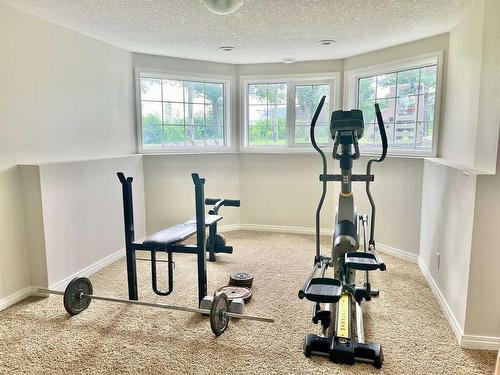 30048A Secondary Road 501, Rural Cardston County, AB - Indoor Photo Showing Gym Room