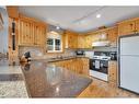 63 Lakeview Drive, Rural Ponoka County, AB  - Indoor Photo Showing Kitchen With Double Sink 