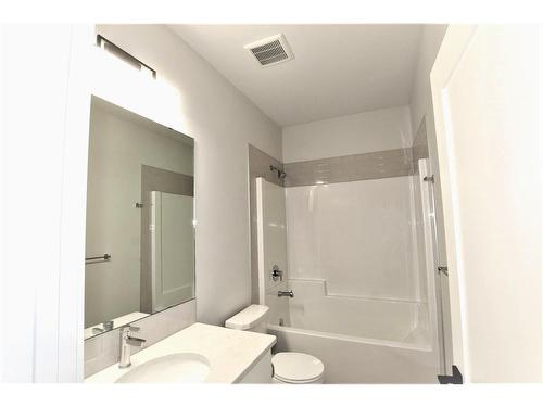 15 Rosse Place, Sylvan Lake, AB - Indoor Photo Showing Bathroom