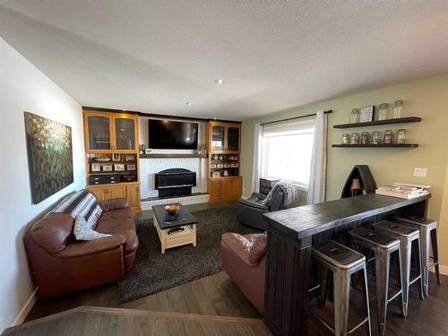38444 Range Road 270, Rural Red Deer County, AB - Indoor Photo Showing Living Room With Fireplace