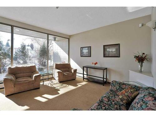 208-4700 55 Street, Red Deer, AB - Indoor Photo Showing Living Room