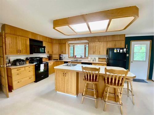 75077 Township Road 39-0, Rural Clearwater County, AB - Indoor Photo Showing Kitchen With Double Sink