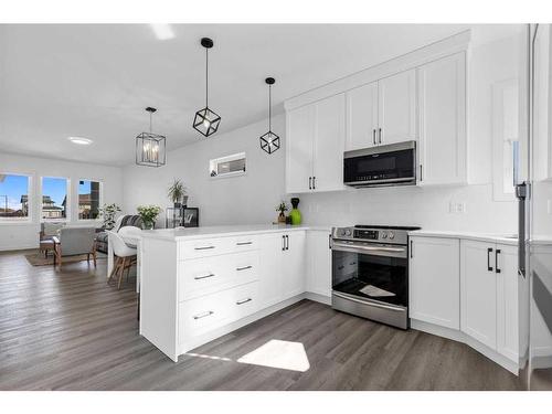 21 Panorama Avenue, Lacombe, AB - Indoor Photo Showing Kitchen With Upgraded Kitchen
