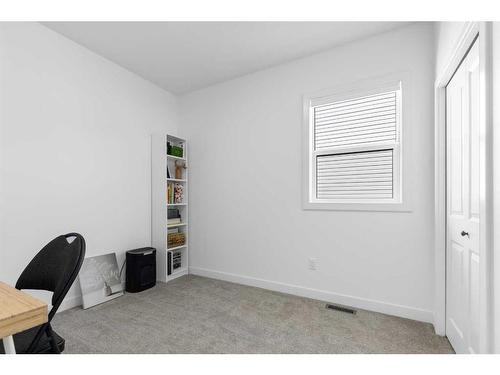 21 Panorama Avenue, Lacombe, AB - Indoor Photo Showing Bedroom