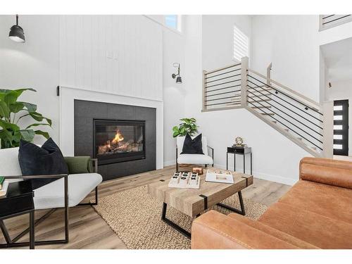 64 Lundberg Crescent, Red Deer, AB - Indoor Photo Showing Living Room With Fireplace