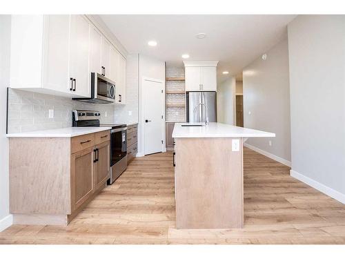 18 Mitchell Crescent, Blackfalds, AB - Indoor Photo Showing Kitchen With Upgraded Kitchen