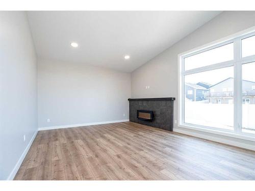 18 Mitchell Crescent, Blackfalds, AB - Indoor With Fireplace
