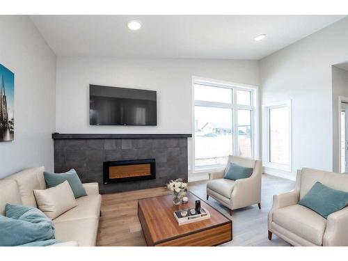 18 Mitchell Crescent, Blackfalds, AB - Indoor Photo Showing Living Room With Fireplace