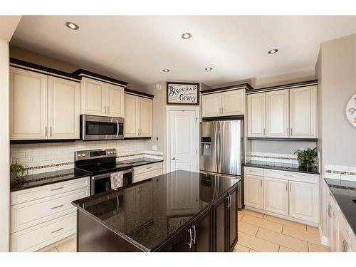48 Cyprus Road, Blackfalds, AB - Indoor Photo Showing Kitchen With Stainless Steel Kitchen