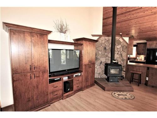 13018 Hwy 53, Rural Ponoka County, AB - Indoor Photo Showing Living Room With Fireplace