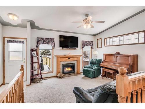 56 Willow Springs Crescent, Sylvan Lake, AB - Indoor With Fireplace