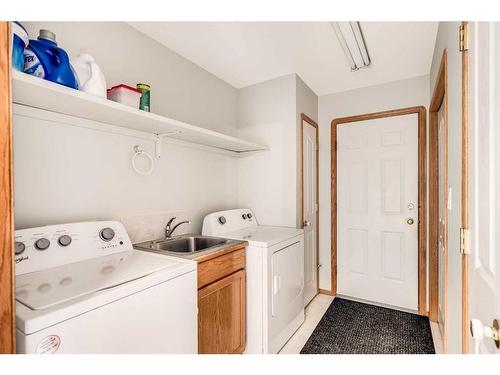56 Willow Springs Crescent, Sylvan Lake, AB - Indoor Photo Showing Laundry Room