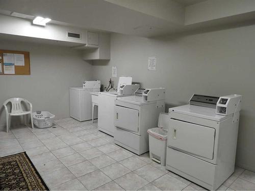 304-5414 53 Street, Lacombe, AB - Indoor Photo Showing Laundry Room