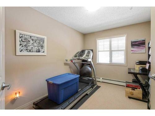 111-11445 Ellerslie Road Sw, Edmonton, AB - Indoor Photo Showing Gym Room