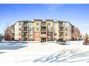 111-11445 Ellerslie Road Sw, Edmonton, AB  - Outdoor With Facade 