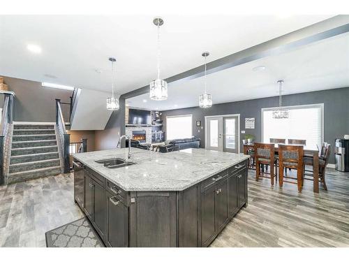 75 Valli Close, Sylvan Lake, AB - Indoor Photo Showing Kitchen With Double Sink With Upgraded Kitchen