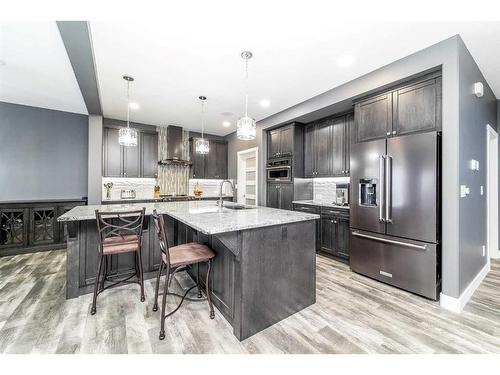 75 Valli Close, Sylvan Lake, AB - Indoor Photo Showing Kitchen With Stainless Steel Kitchen With Upgraded Kitchen