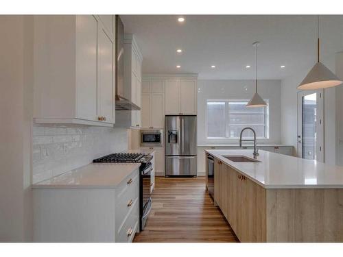 35 Bluerock Avenue Sw, Calgary, AB - Indoor Photo Showing Kitchen With Upgraded Kitchen