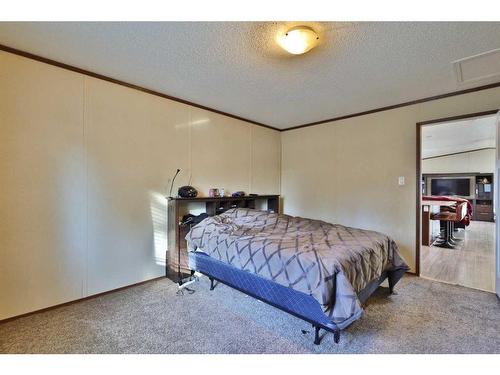 213 Percy Street, Bittern Lake, AB - Indoor Photo Showing Bedroom