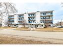 204-4522 47A Avenue, Red Deer, AB  - Outdoor With Balcony With Facade 