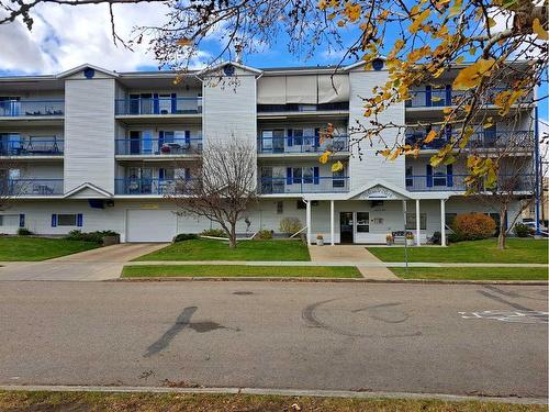 204-4522 47A Avenue, Red Deer, AB - Outdoor With Balcony With Facade