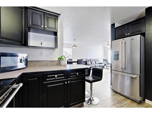 14 Harrigan Street, Sylvan Lake, AB - Indoor Photo Showing Kitchen With Upgraded Kitchen