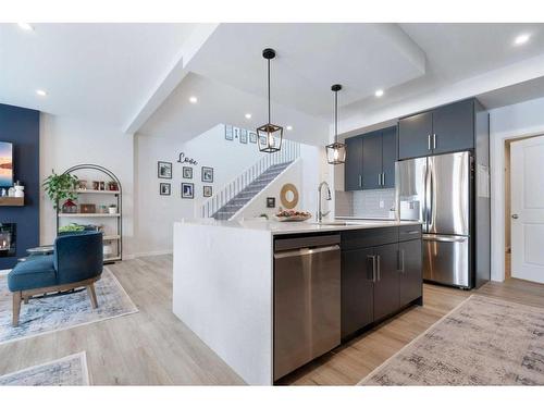 72 Emmett Crescent, Red Deer, AB - Indoor Photo Showing Kitchen With Stainless Steel Kitchen With Upgraded Kitchen