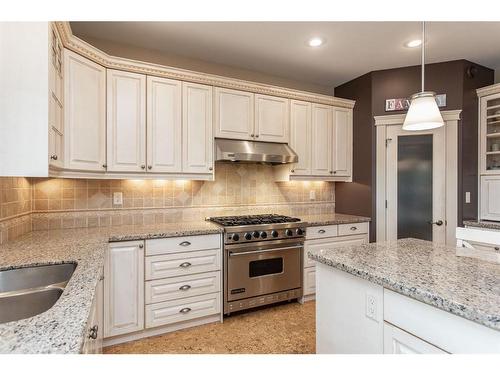 53 Allard Crescent, Red Deer, AB - Indoor Photo Showing Kitchen With Double Sink With Upgraded Kitchen