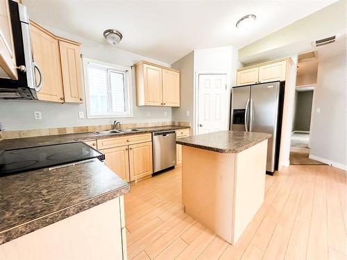 6420 52 Street, Ponoka, AB - Indoor Photo Showing Kitchen With Double Sink