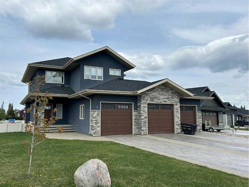 2 Meadow Close, Lacombe, AB - Outdoor With Facade