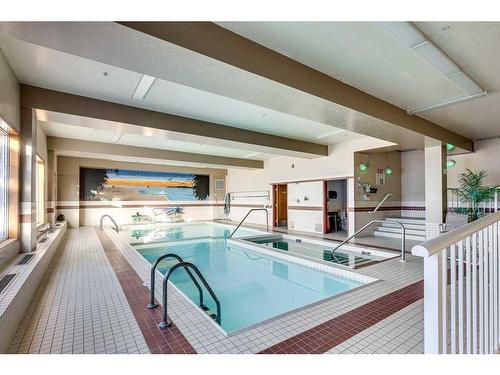 304-5300 48 Street, Red Deer, AB - Indoor Photo Showing Other Room With In Ground Pool
