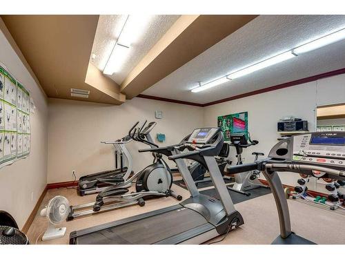 304-5300 48 Street, Red Deer, AB - Indoor Photo Showing Gym Room