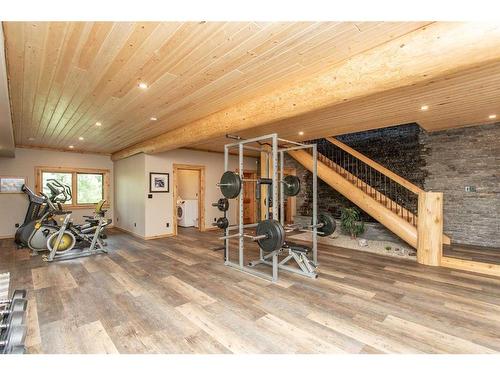 34226 Range Road 43, Rural Mountain View County, AB - Indoor Photo Showing Gym Room