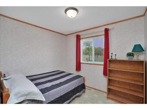 75 Sands Street, Rochon Sands, AB - Indoor Photo Showing Bedroom