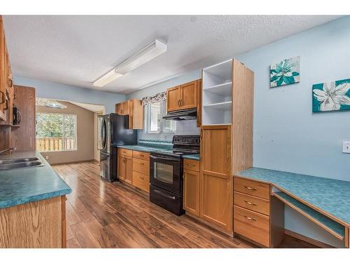 106-Sunnyside 100 Place, Rural Ponoka County, AB - Indoor Photo Showing Kitchen