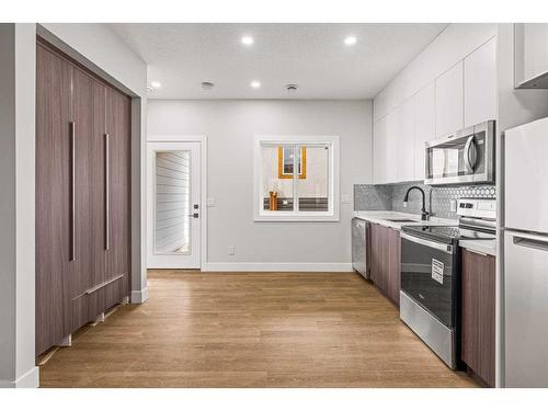 Unit 1-1615 1 Avenue, Canmore, AB - Indoor Photo Showing Kitchen