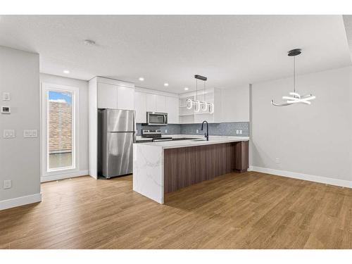 Unit 1-1615 1 Avenue, Canmore, AB - Indoor Photo Showing Kitchen