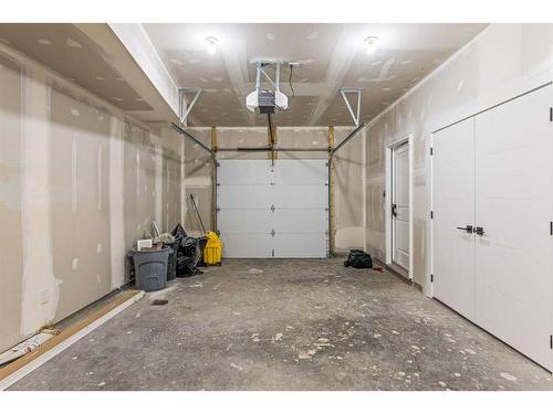 Unit 1-1615 1 Avenue, Canmore, AB - Indoor Photo Showing Garage