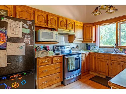 Sunhaven Road, Rural Lacombe County, AB - Indoor Photo Showing Kitchen With Double Sink