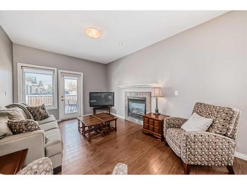 4518 54 Street, Ponoka, AB - Indoor Photo Showing Living Room With Fireplace