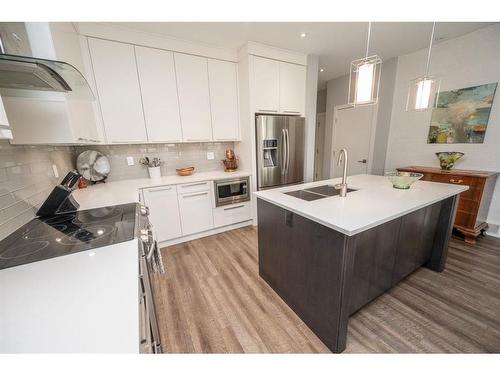 4607 45 Street, Red Deer, AB - Indoor Photo Showing Kitchen With Double Sink With Upgraded Kitchen