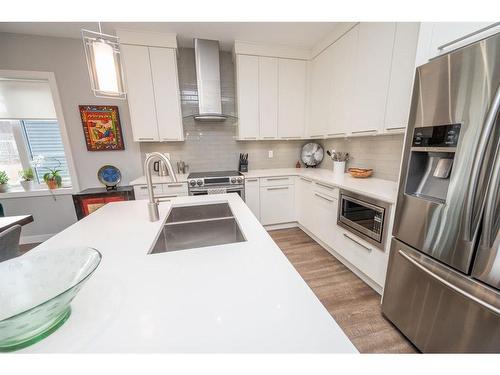 4607 45 Street, Red Deer, AB - Indoor Photo Showing Kitchen With Double Sink With Upgraded Kitchen