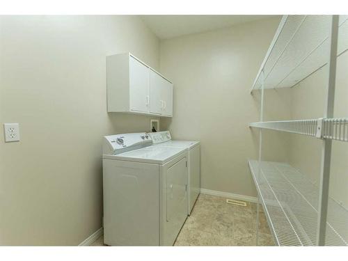 5008 B 49 Street, Stettler, AB - Indoor Photo Showing Laundry Room
