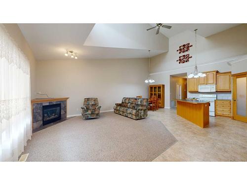 5008 B 49 Street, Stettler, AB - Indoor With Fireplace